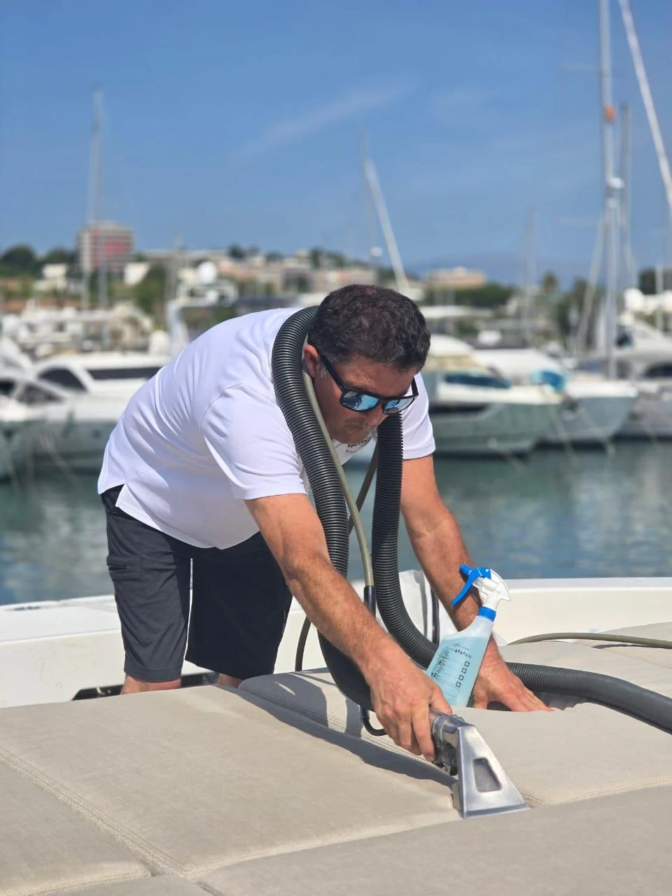 Carpet Care technician working on a yacht in Golfe-Juan
